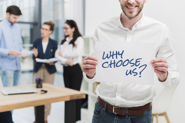 business-man-holding-paper-with-why-choose-us-question_23-2148932312